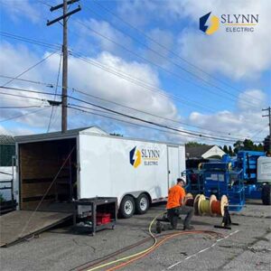 Macomb Commercial Electrical Contractor working outside of commercial building. 